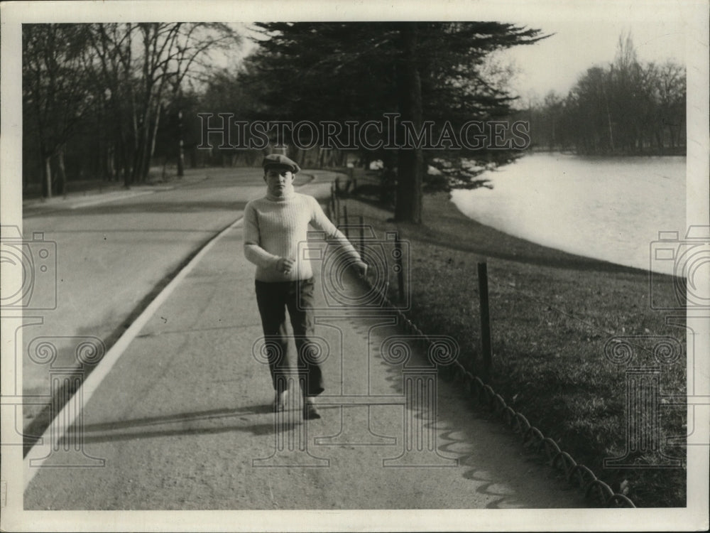 1929 Press Photo Boxer Emile Pladner walks next to a lake while training- Historic Images