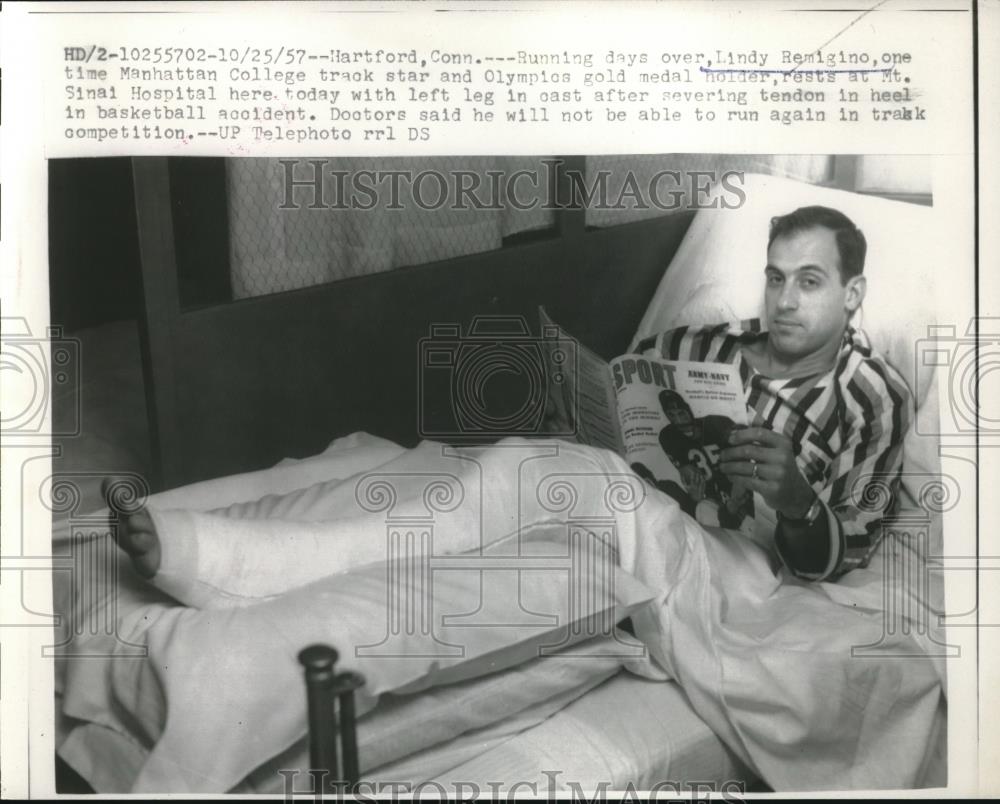 1957 Press Photo Lindy Remingino will not play again due to torn tendon - Historic Images