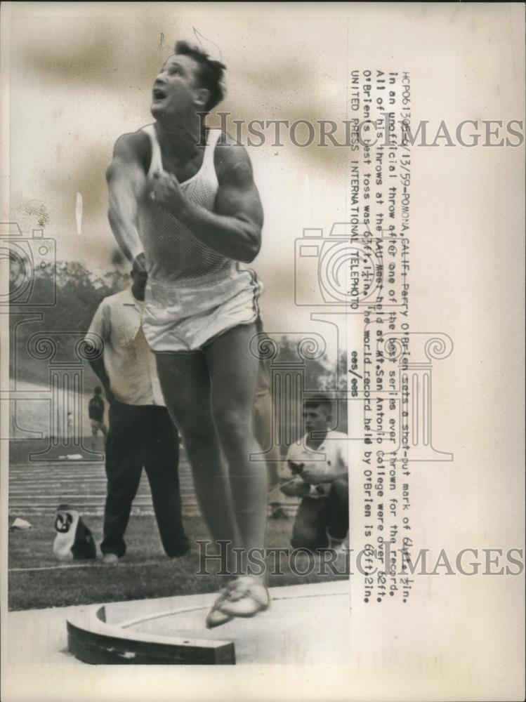 1959 Press Photo Parry O'Brien shot puts at Pomona CA track meet - net32470 - Historic Images
