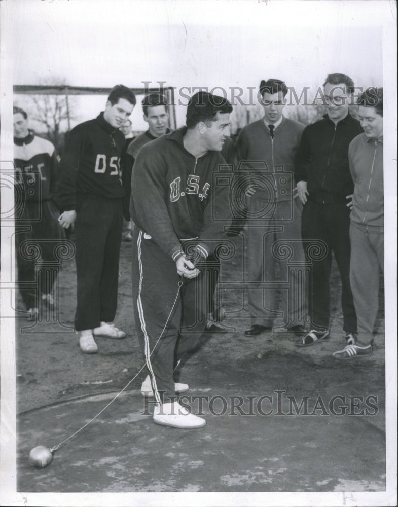 1957 Hammer Thrower Connolly Demonstrating - Historic Images