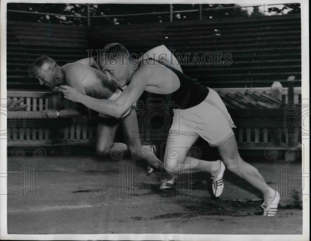 1957 Lennart and Bobby Strandberg working out at track - Historic Images