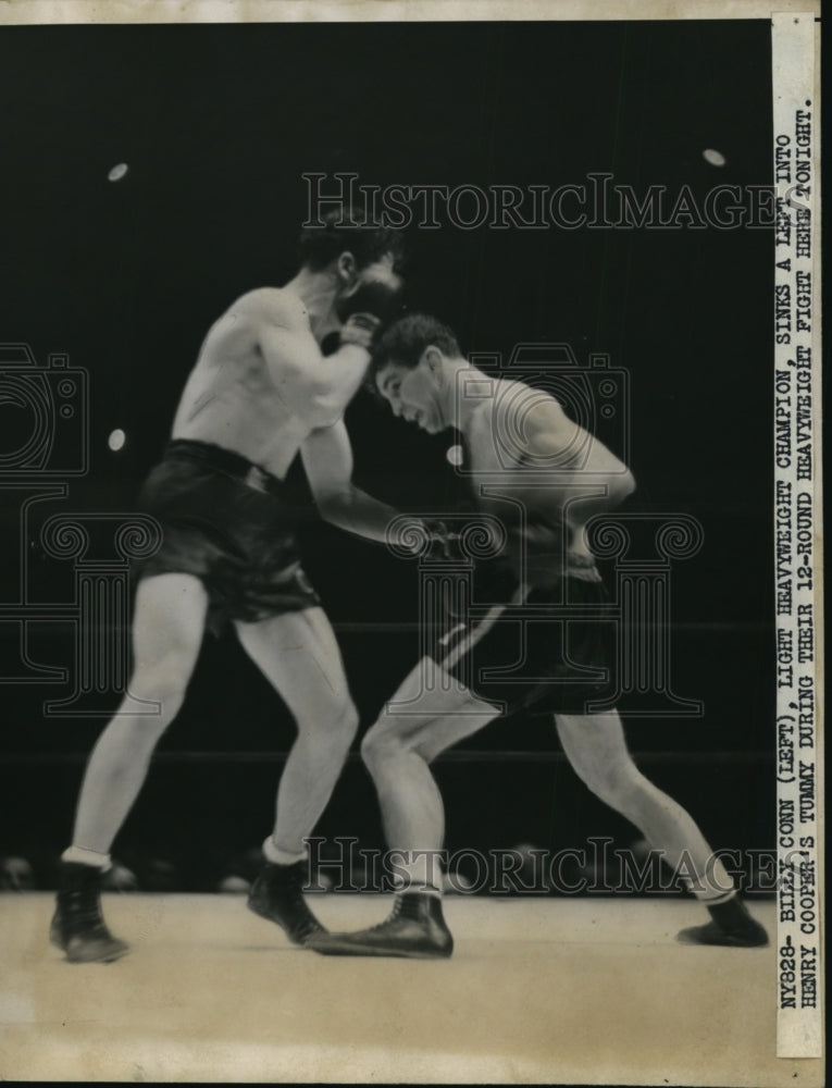 1940 Press Photo Billy Conn vs Henry Cooper in 12 round bout in NY - nes44665- Historic Images