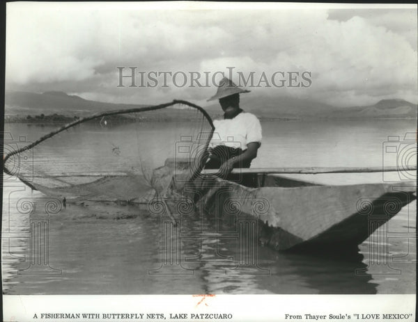 Mexico, Lake Pazcuaro. Butterly fisherman casting nets