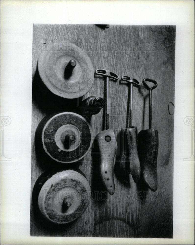 1985 Press Photo Tools, three shoe stretchers, a bottle- Historic Images