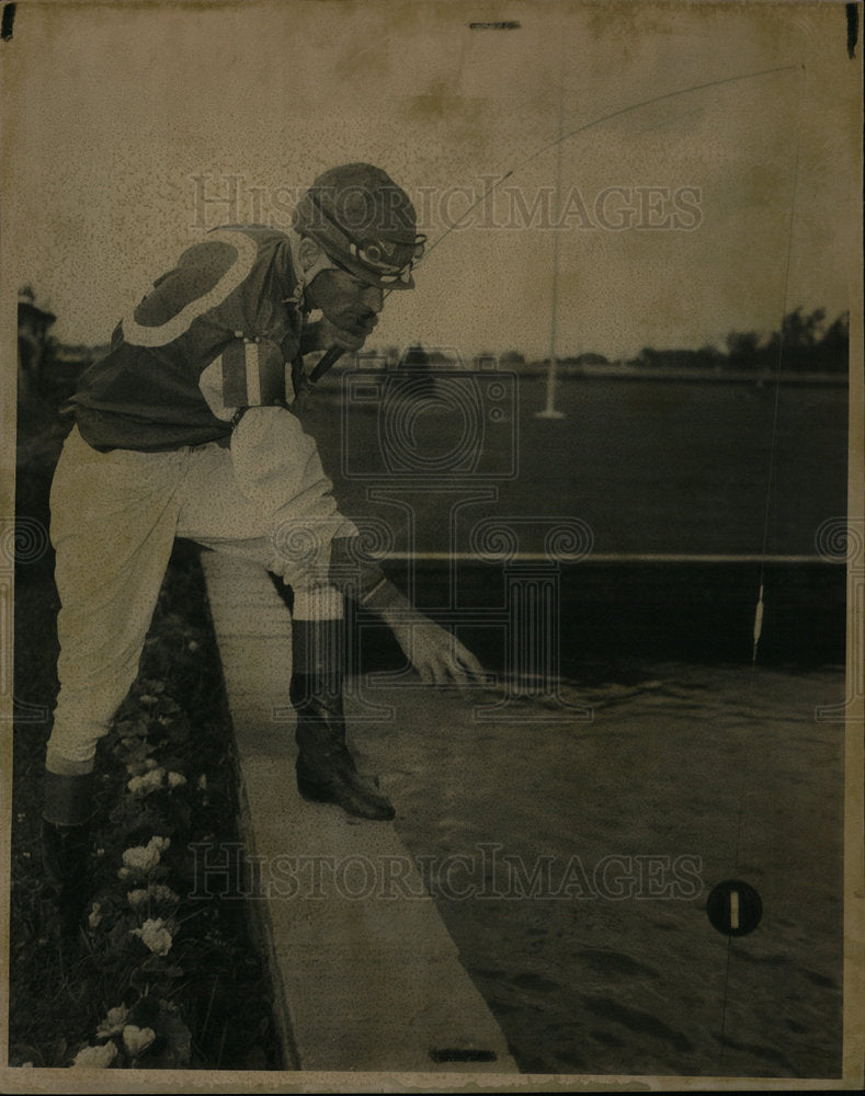 1962 Press Photo Jockey Tommy Barrow Loves Fishing - DFPD18643- Historic Images