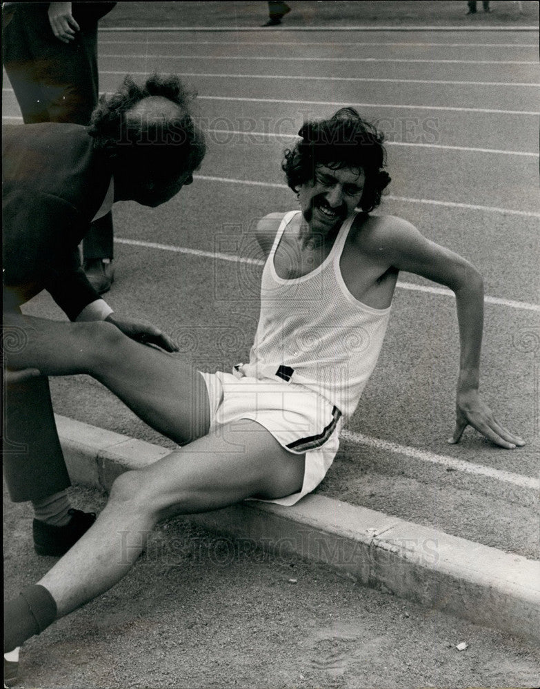 Load image into Gallery viewer, 1971 Press Photo David Bedford injured in 5,000-metre track meet run - KSB15803
