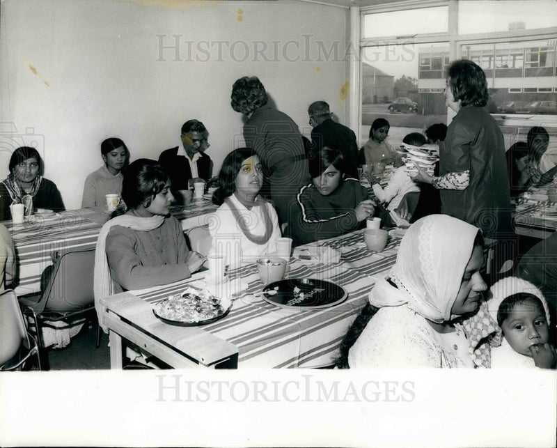 Load image into Gallery viewer, 1972 Press Photo Asian Refugees Eat In Special Lounge At Stansted Airport
