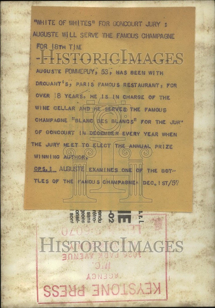 Load image into Gallery viewer, 1957 Press Photo Auguste Pommepuy serving champagne Blanc des Blangs""
