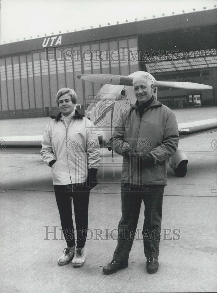 Load image into Gallery viewer, 1969 Press Photo Henri Martinet and Wife in front of a Caudron C.714
