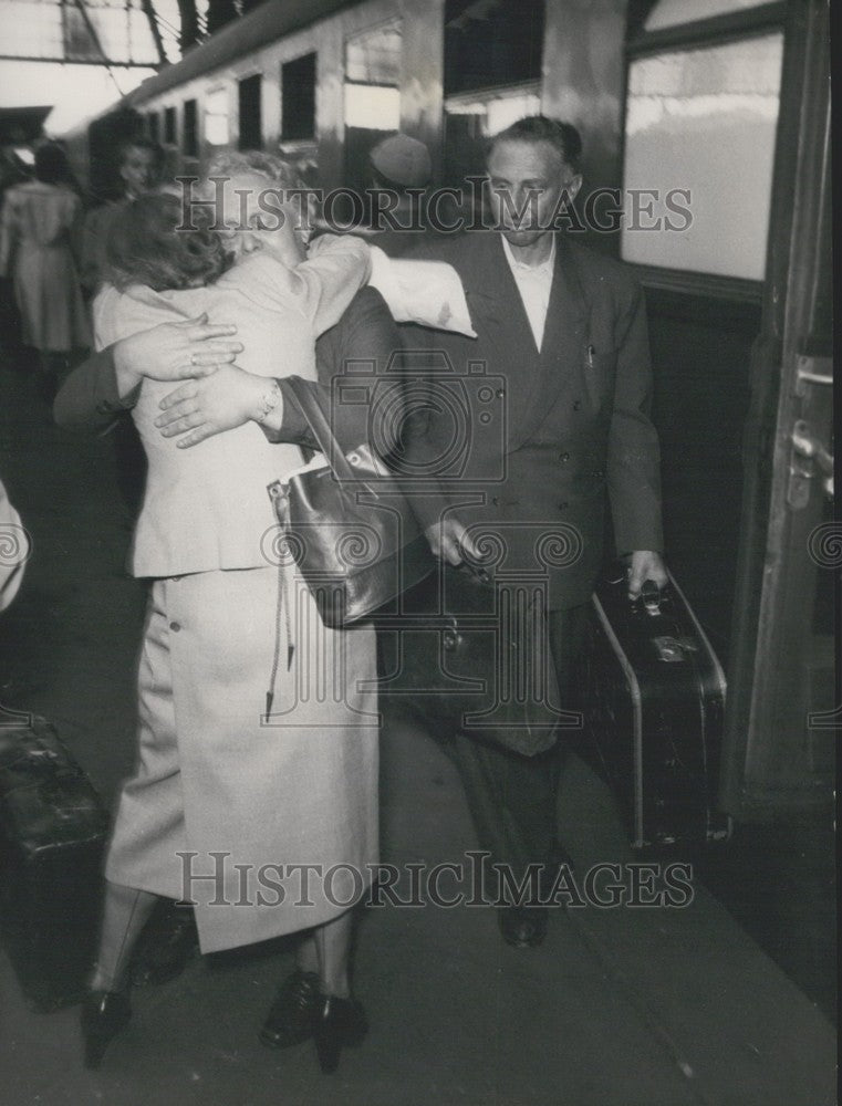 1953 Press Photo West and East Germans Tearfully Greet One Another.