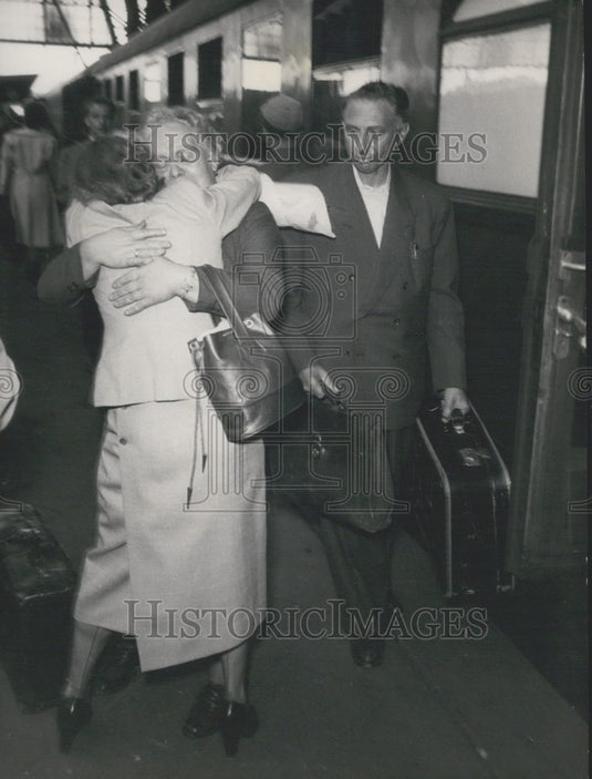 1953 Press Photo West and East Germans Tearfully Greet One Another.