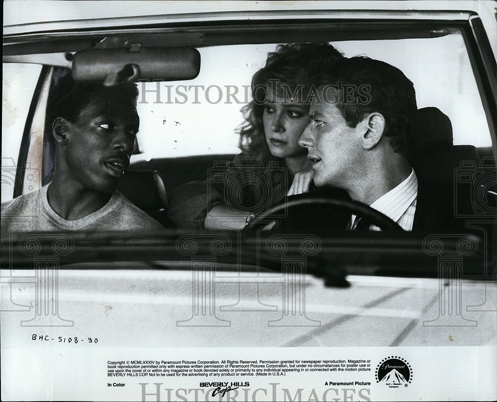 1984 Press Photo Eddie Murphy, Lisa Eilbacher, J. Reinhold &quot;Beverly Hills Cop&quot;- Historic Images