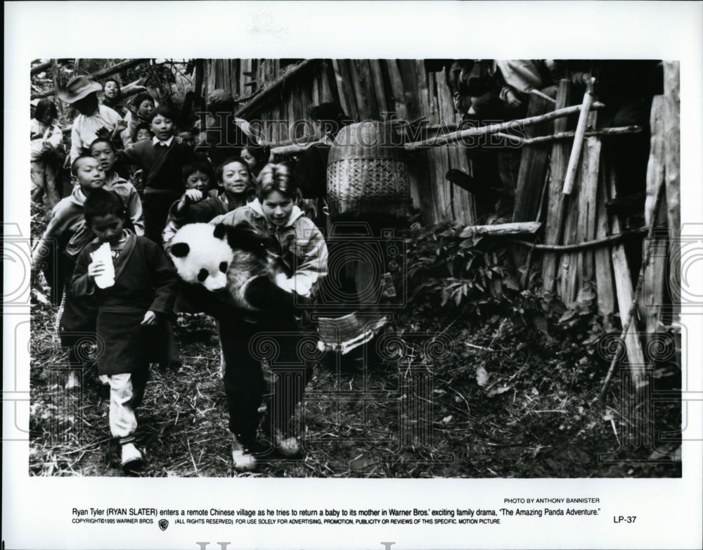 1995 Press Photo Ryan Slater Actor Chinese Village Scene Amazing Panda Adventure- Historic Images