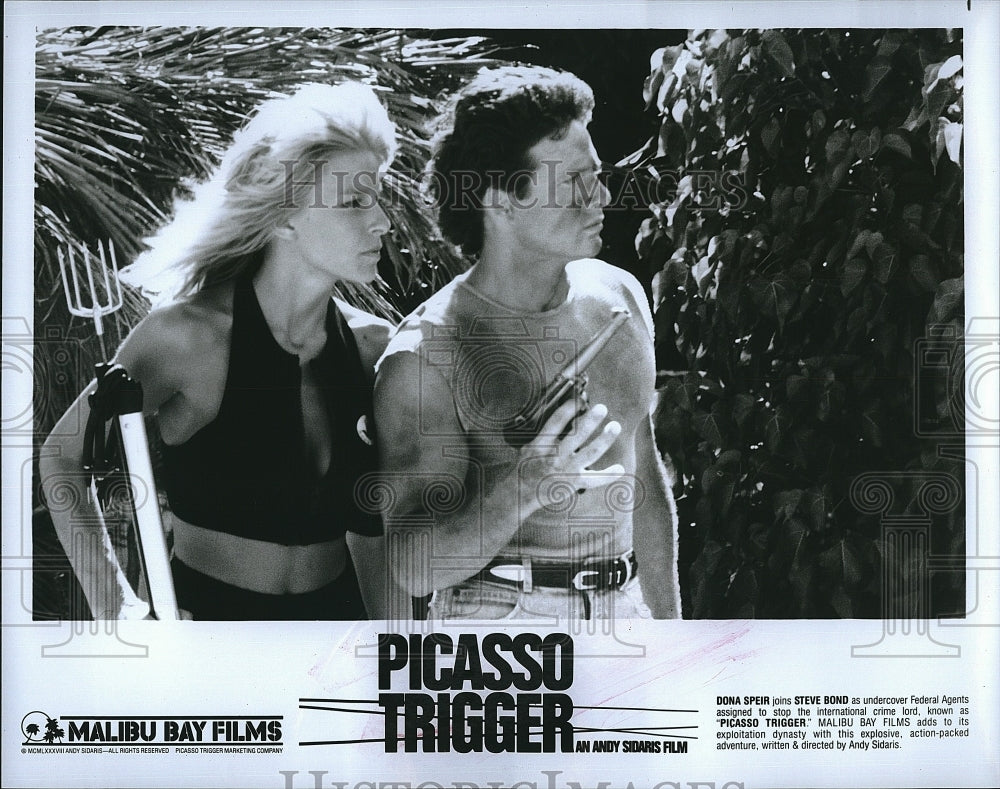 1988 Press Photo Actor Steve Bond &amp; Dona Speir in &quot;Picasso Trigger&quot;- Historic Images