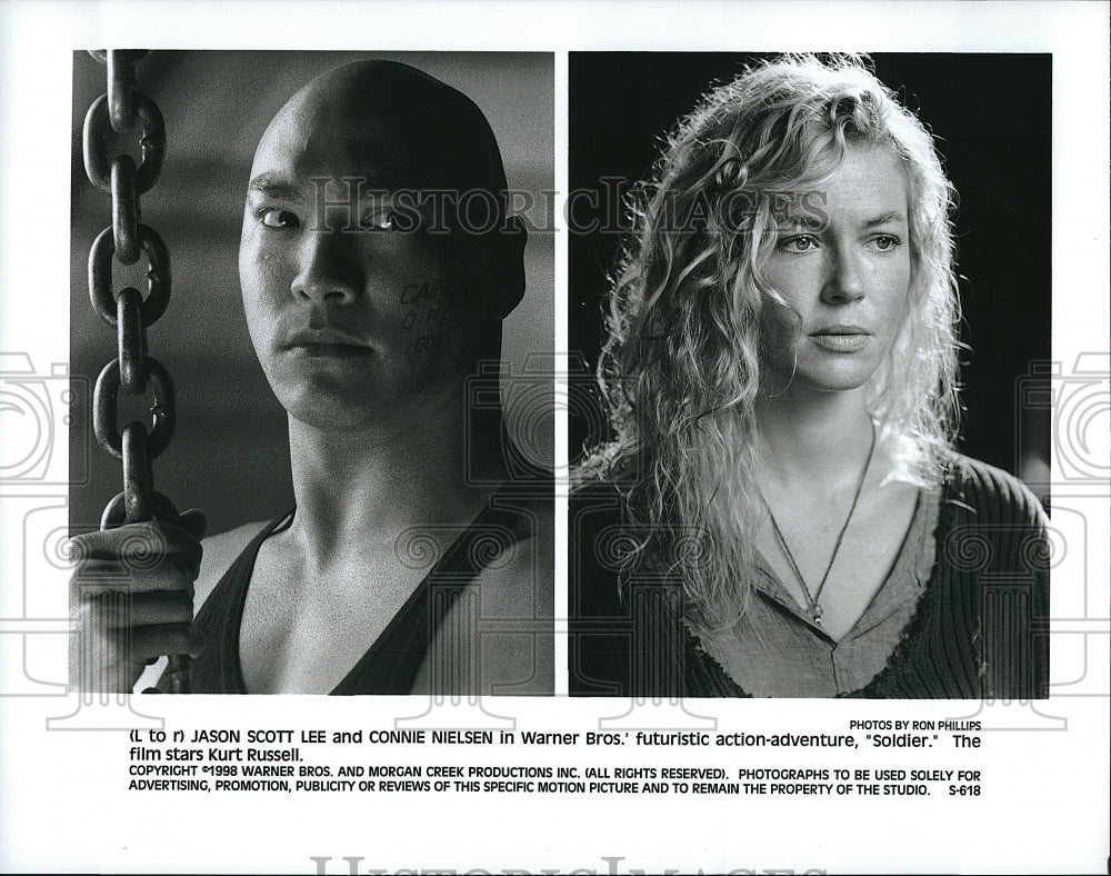 1998 Press Photo Jason Scott Lee Actor Connie Nielsen Actress Soldier Movie Film- Historic Images