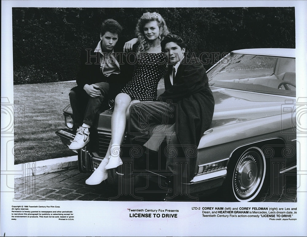 1988 Press Photo Corey Haim, Corey Feldman, Heather Graham, &quot;License to Drive&quot;- Historic Images