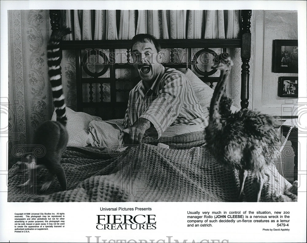 1996 Press Photo John Cleese staring in &quot;Fierce Creatures&quot;- Historic Images