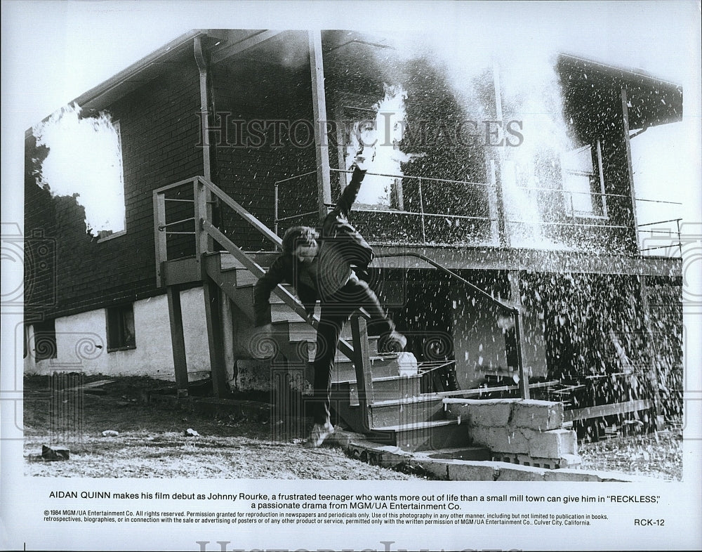 1984 Press Photo Reckless Film Actor Aidan Quinn Explosion Scene- Historic Images