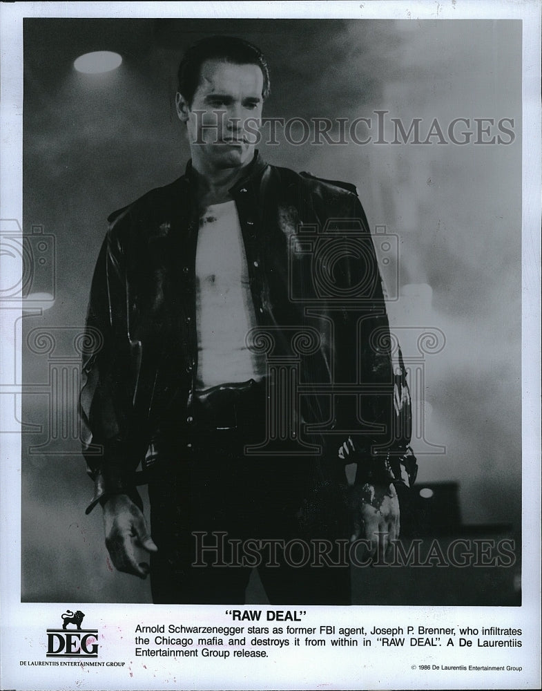 1986 Press Photo Arnold Schwarzenegger Actor Raw Deal Movie Scene Film- Historic Images