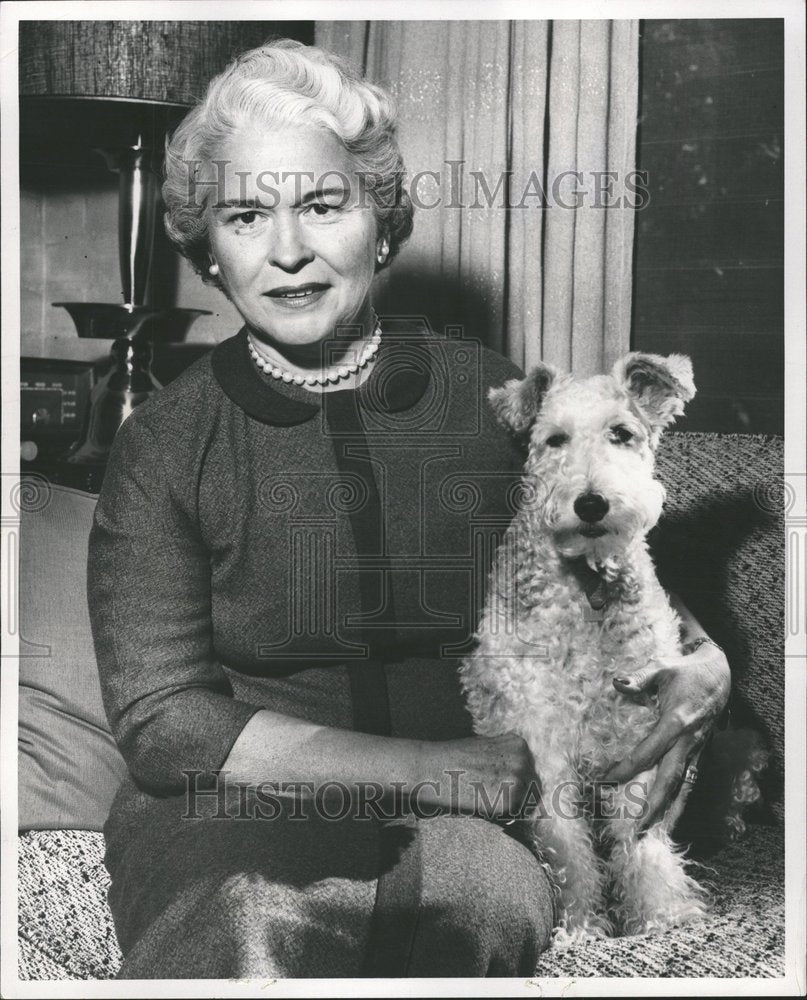 1957 Press Photo Mrs George Trumbull Hand Bed Dog Woman - RRV54981- Historic Images