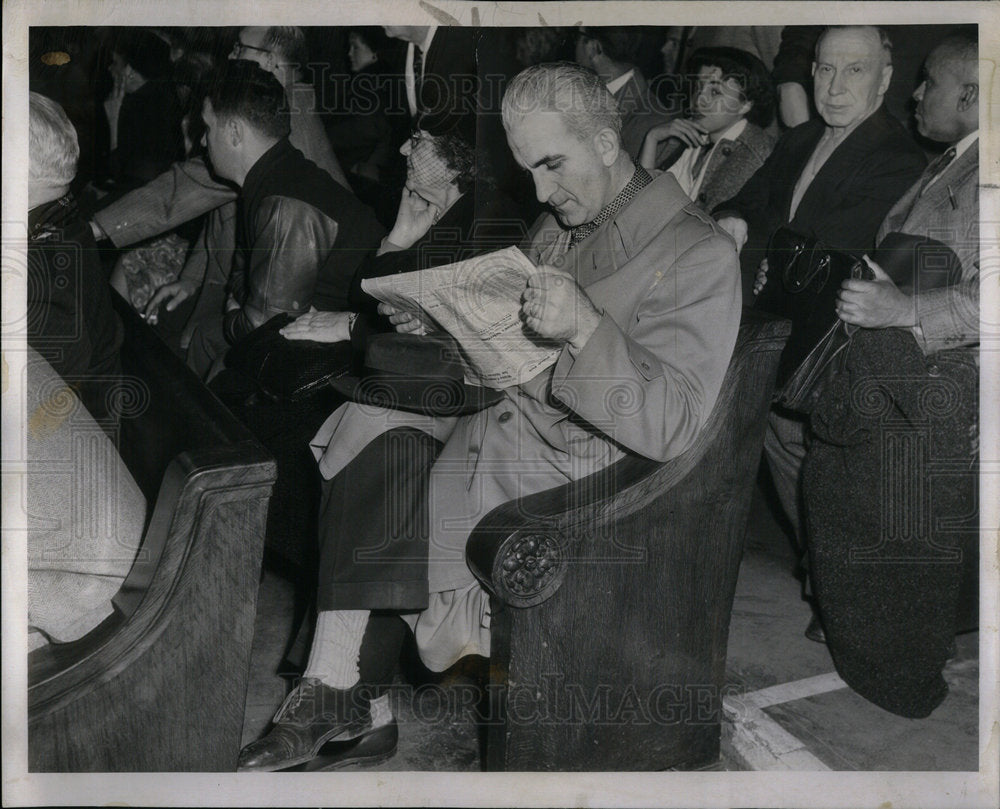 1953 Press Photo Man Reads Paper - RRX02623- Historic Images