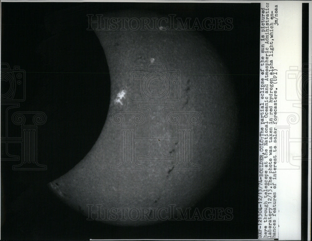 1974 Press Photo Partial Eclipse Sun Red Hydrogen Light - RRX03013- Historic Images