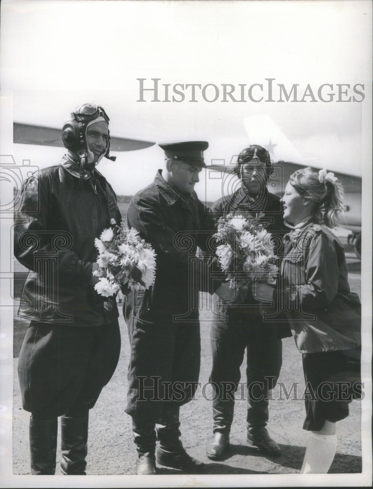 1956 Press Photo Airmen Flowers young girl East German- RSA12551- Historic Images