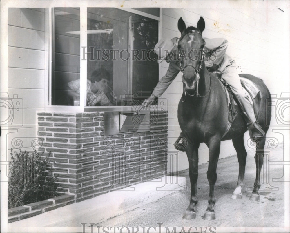Undated Press Photo Man rides horse through drive-thru- RSA30137- Historic Images