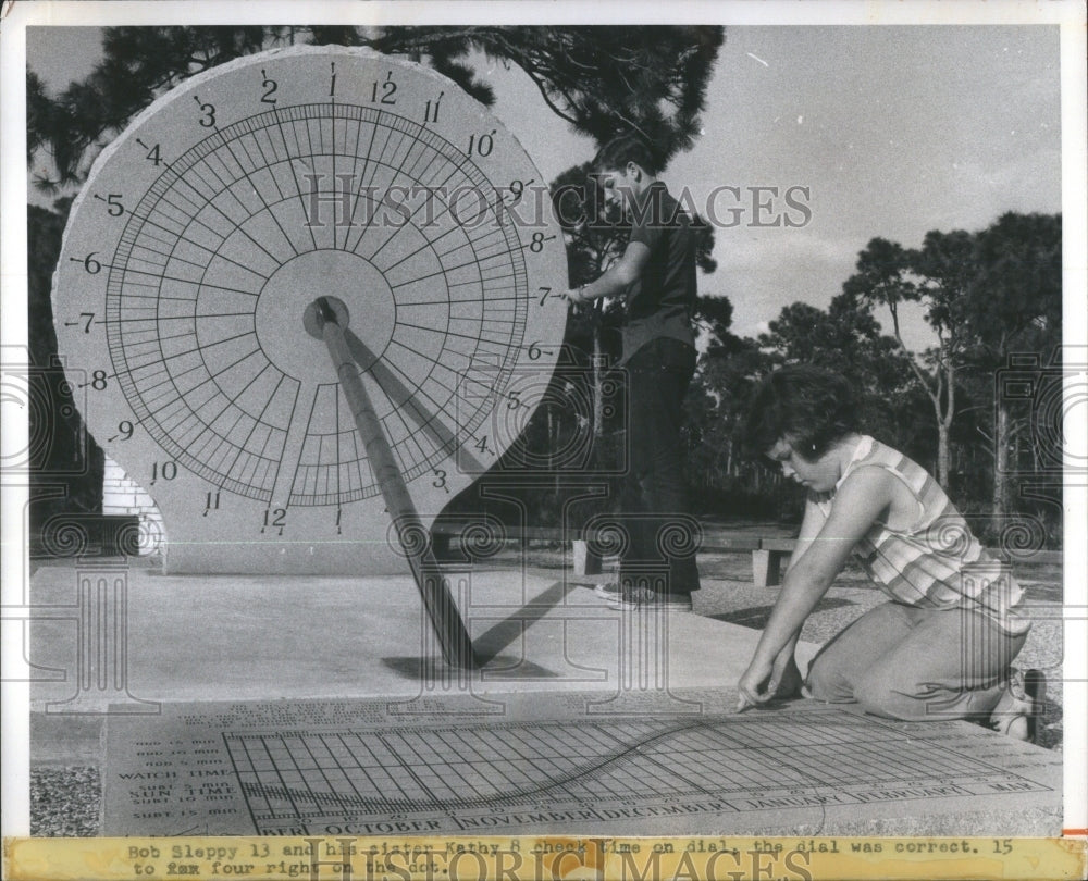 Bob Sleppy,13, and his sister Kathy, 8, check time on d- RSA31167- Historic Images