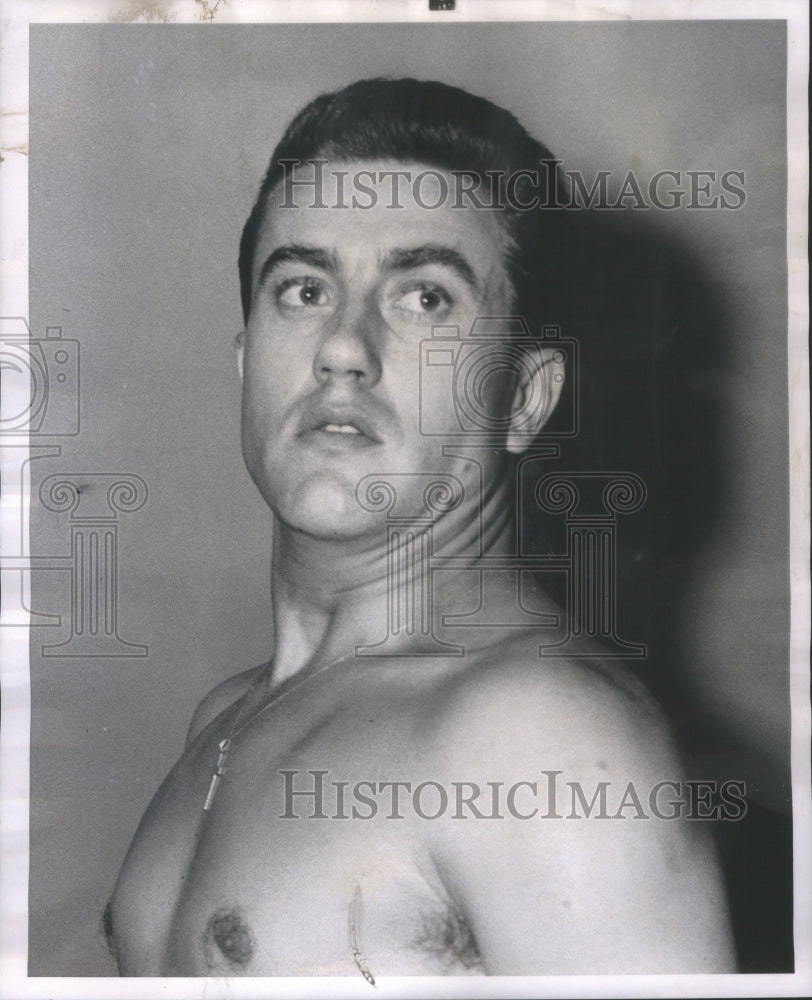1962 Press Photo Daredevil Lazovich Shows Neck Muscles- RSA40567- Historic Images