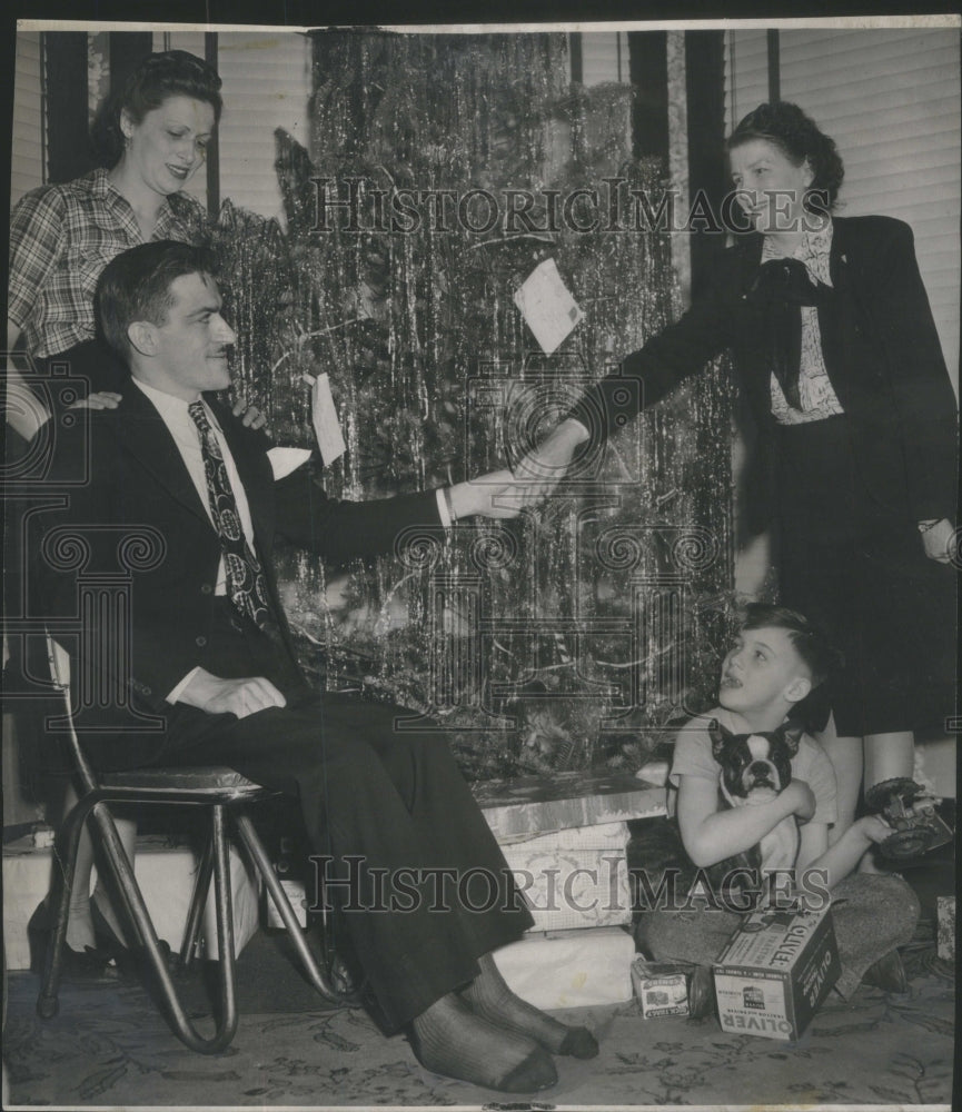 1948 Press Photo Cornelius Koster home for the Christmas.- Historic Images