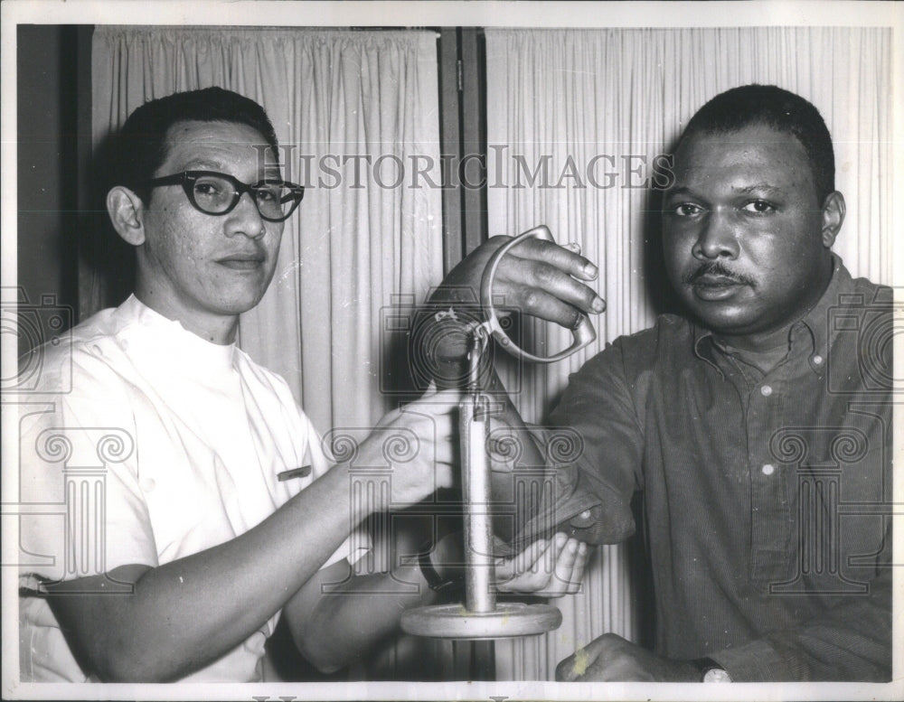 1965 Press Photo Arthur Holmes Severed Hand Dr. William D. Shorey Rehabilitation- Historic Images