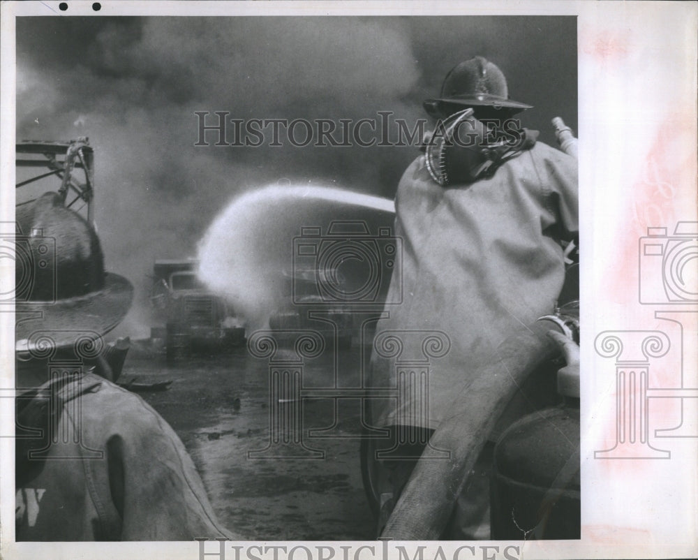 1967 Press Photo Construction Company Firefighters Smoke Flame  St. Petersburg- Historic Images