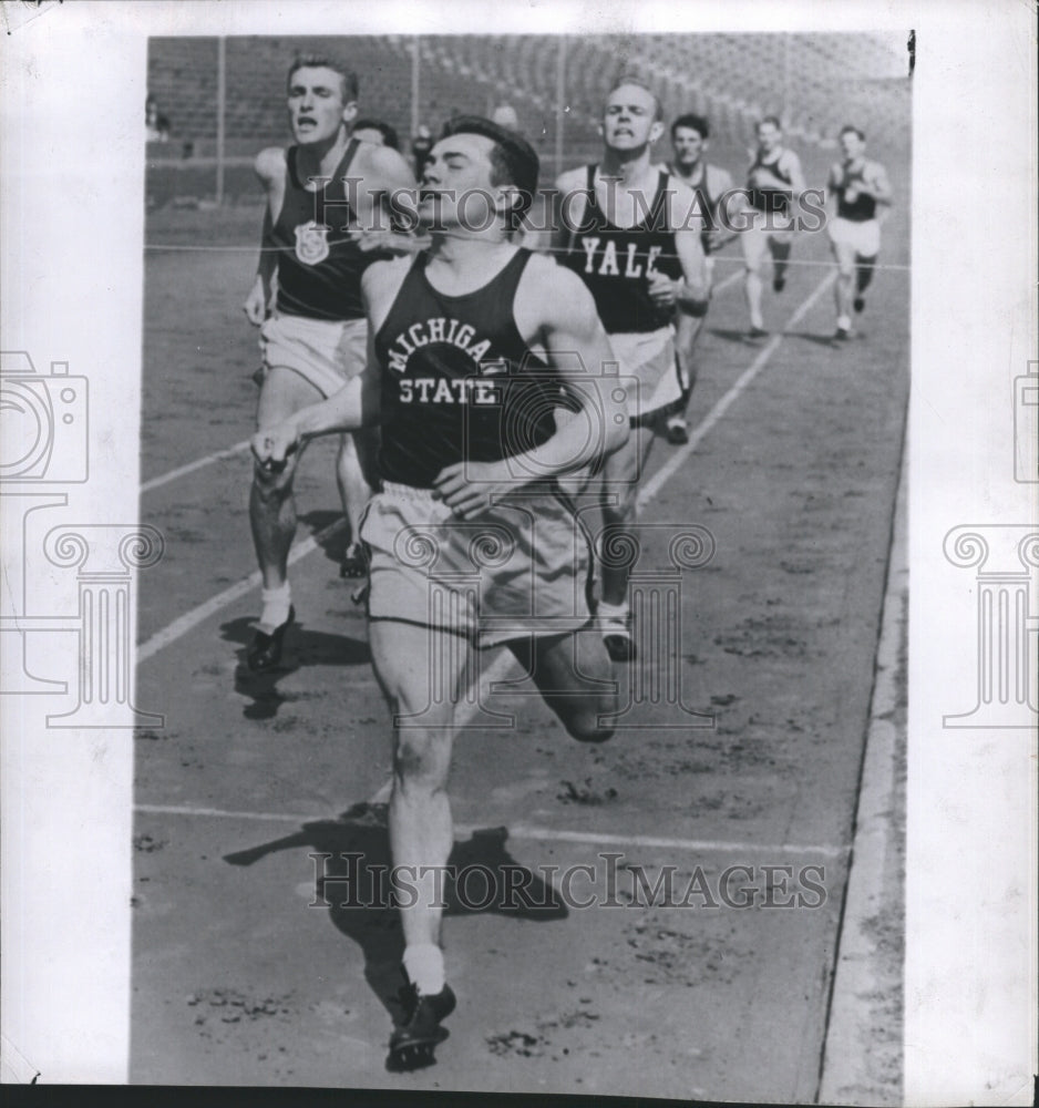 1950 Press Photo Michigan state runner wins. - Historic Images