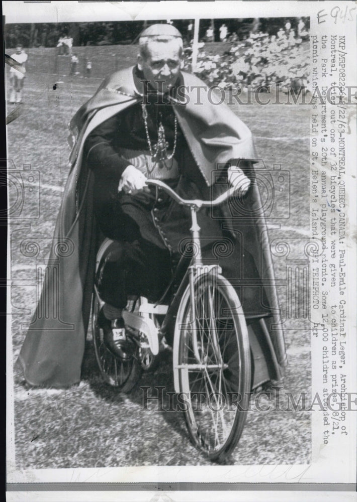 1963 Press Photo Paul-Emile Cardinal Leger tries out a bicycle - Historic Images