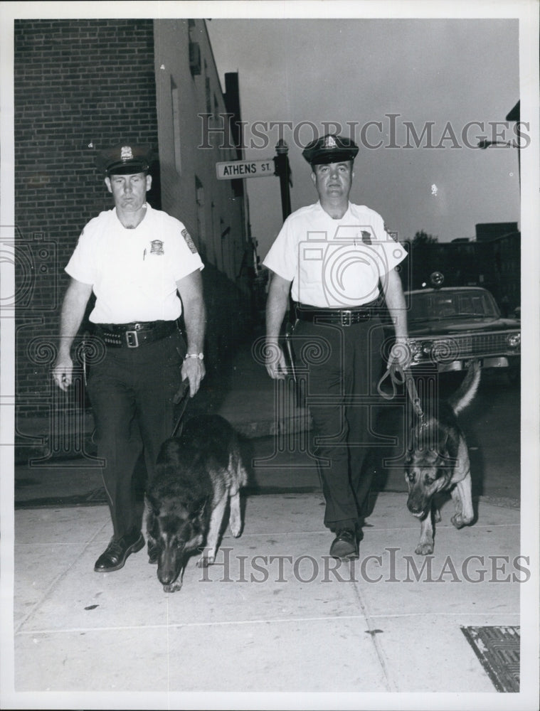 1966 Press Photo Officers Benson and Cesera  - Historic Images