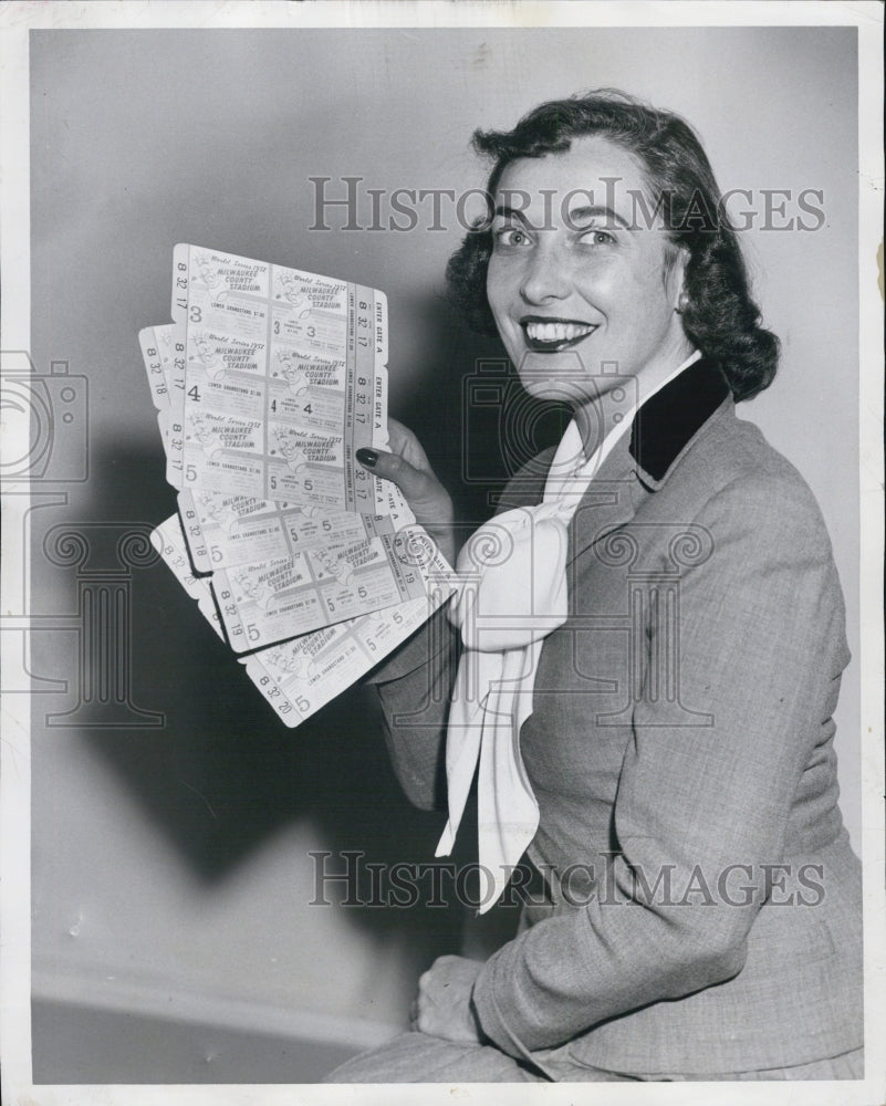 1957 Press Photo Columnist, Emily Macy with tickets for contest- Historic Images