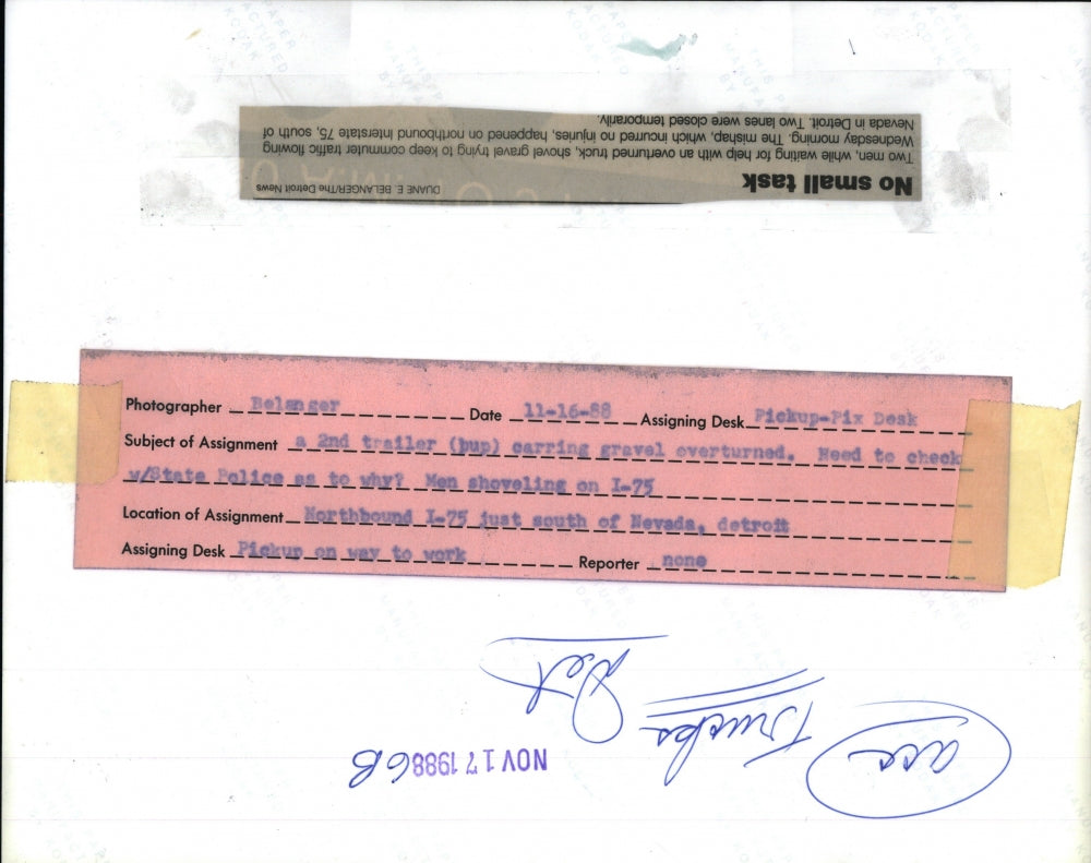 1988 Press Photo two men help overturned truck gravel traffic Interstate 75