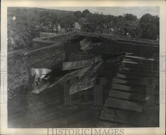 Historic Images -Part of roof of Alexander City High School. Roof was also peeled off of Masonic building. Tornadoes, Alabama<br><br>Photo dimensions are 10 x 8.25 inches.<br><br>Photo is dated 1943.<br><br> Photo back: <br><br> <img src="http://hipe.historicimages.com/images/abna/abna00258b.jpg"width="340">