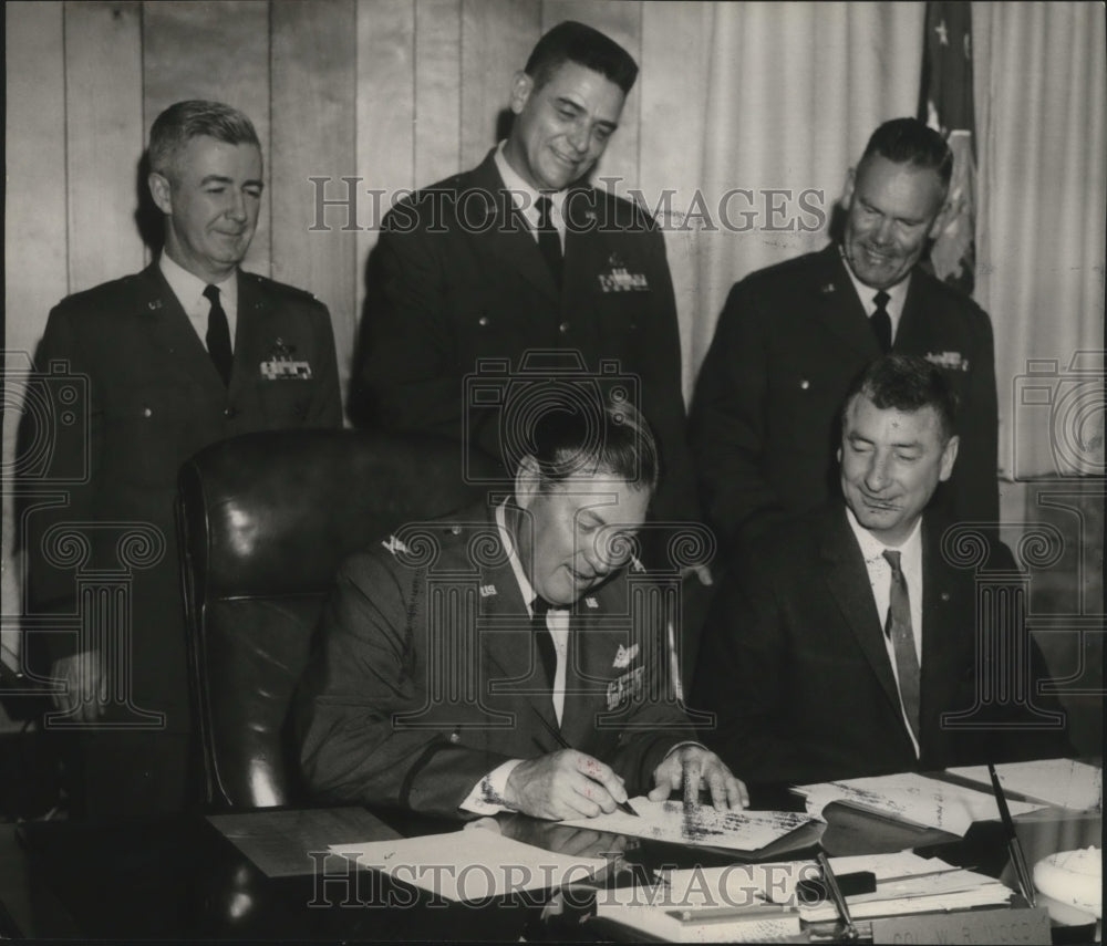 1965 Press Photo Colonel Wood Signs Troy State College Education Pact, Alabama- Historic Images