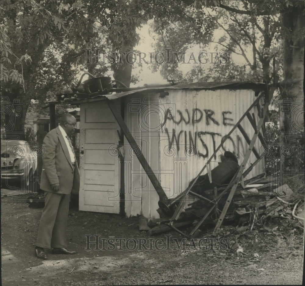 1972 Press Photo Homeowner beside trash pile in Ensley, Alabama- Historic Images