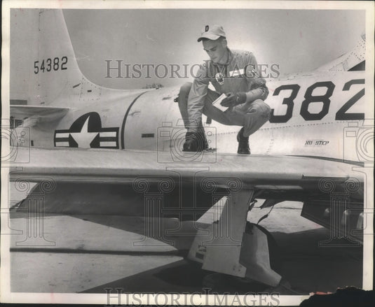 1967 Press Photo flight crew member checking plane, Craig Air Field, Selma, AL- Historic Images