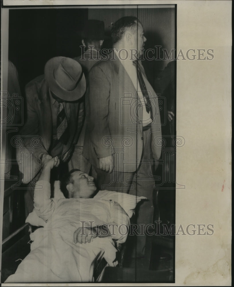 1954 Press Photo Albert Fuller on trial on stretcher- Historic Images