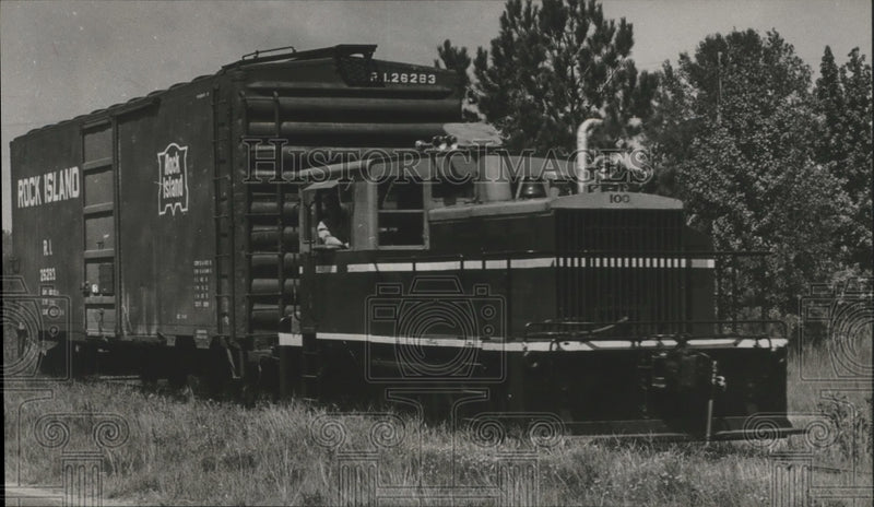 Load image into Gallery viewer, 1962 Press Photo Train engine and Rock Island box car, Tuskegee, Alabama
