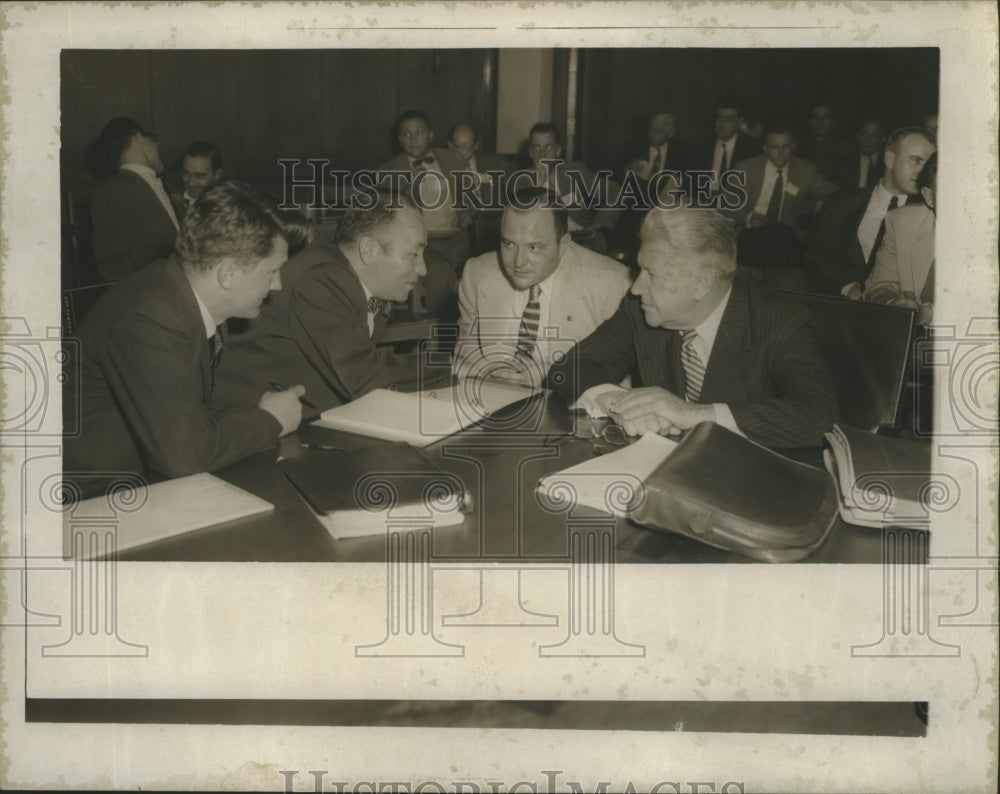 1955 Press Photo Men discuss the trial and case of Albert Fuller - abna14995 - Historic Images