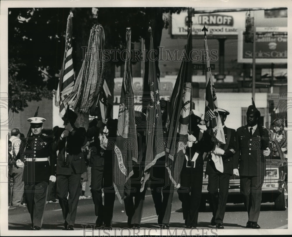 Press Photo Veterans Day Parade Color Guard with Flags - abna17222