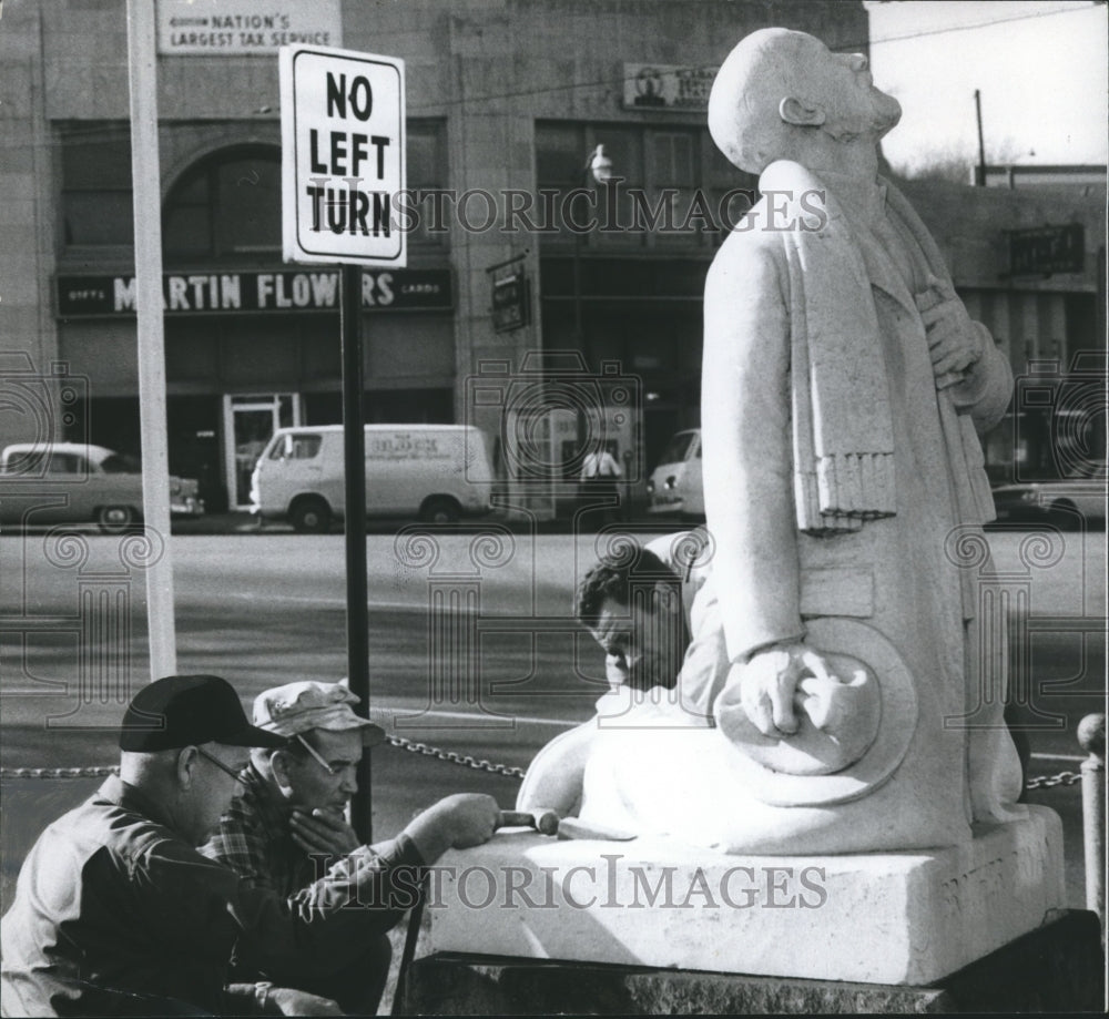 1966 Press Photo Workers inspect  Brother James Bryan Statue for relocation- Historic Images