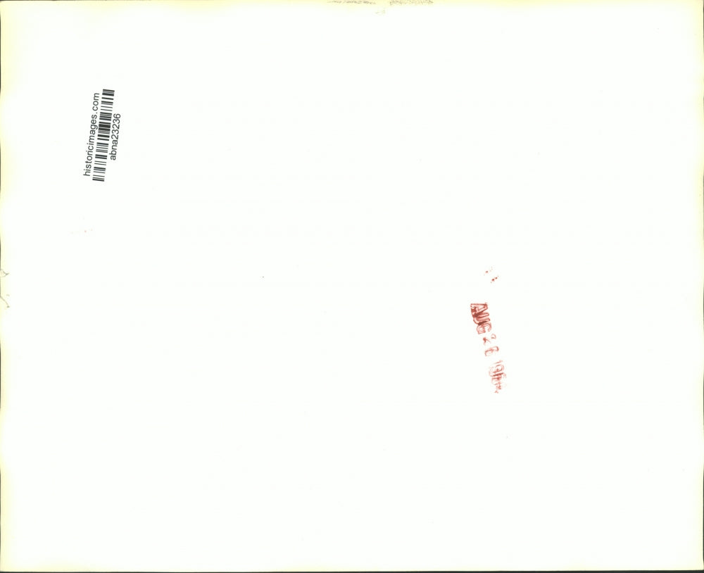 Press Photo Building alongside a small body of water - abna23236