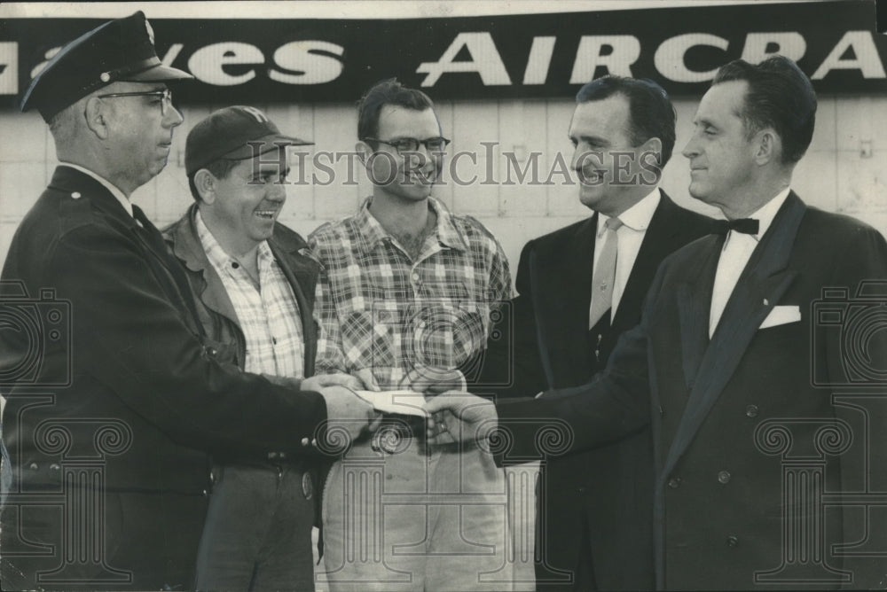 1956 Press Photo Hayes Aircraft employees donate to Birmingham Junior Police- Historic Images