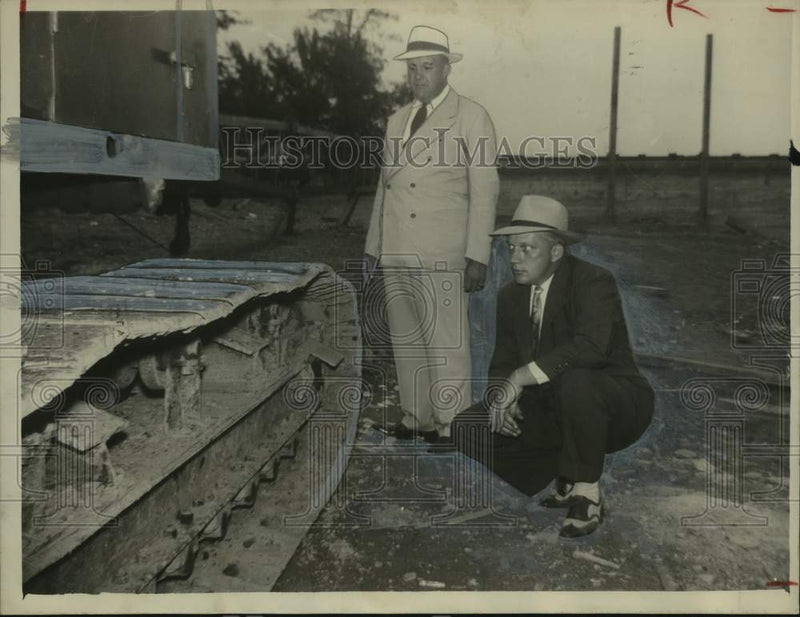 Load image into Gallery viewer, 1953 Press Photo L.B. Sullivan &amp; Joe Smelley inspect damage at job site Alabama
